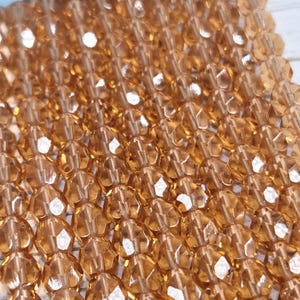 50 Pcs Pale Pink 7mm Round Faceted Fire Polished Preciosa Glass Beads