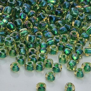 Amber/Green Inside Color Lined Miyuki Triangle Size  8/0 (15g Pkg)