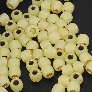 TOHO Round 6/0 Tube 2.5" : PermaFinish - Translucent Silver-Lined Jonquil