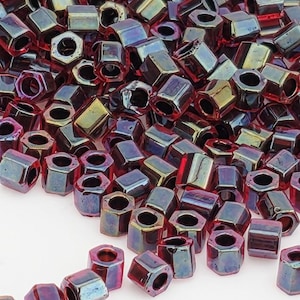 Tubo hexagonal TOHO 8/0 de 2,5": Rubí arcoíris interior/Revestimiento Jet