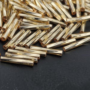 Miyuki Twisted Bugles 2x12 Gold Translucent Silver-Lined Size 2x12mm