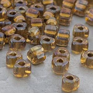 Amber/Amber Inside Color Lined Sparkle Miyuki Triangle Size  5/0 (15g Pkg)