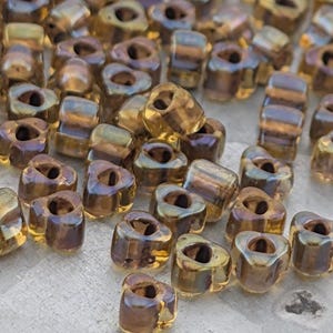 Amber/Brown Inside Color Lined Miyuki Triangle Size  5/0 (15g Pkg)