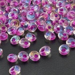 Toho Magatama Beads, Crystal/Opaque Fuchsia-Lined | 3mm | 7-8g (14g packs) Pack