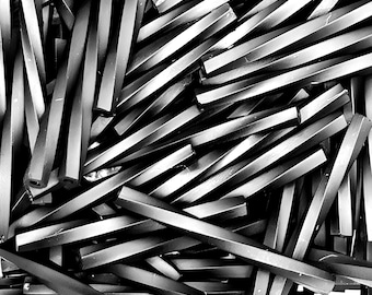 30mm Half Matte/Opaque Jet Black Twisted Bugel Beads