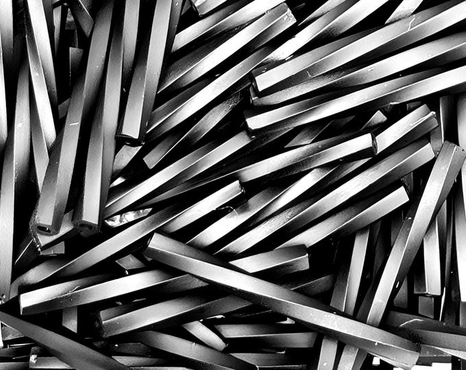 30mm Half Matte/Opaque Jet Black Twisted Bugel Beads
