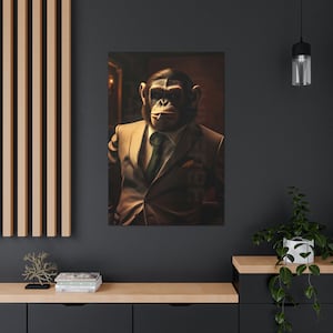 May include: A chimpanzee wearing a brown suit with a green tie. The chimpanzee is looking directly at the camera with a serious expression.