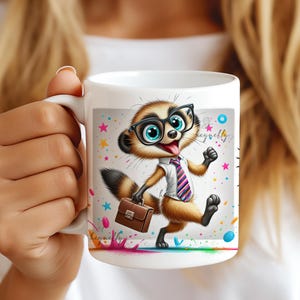 May include: White ceramic mug featuring a cartoon meerkat wearing glasses, a tie, and carrying a briefcase. The meerkat is depicted with a cheerful expression, surrounded by colorful stars and paint splatters. The mug has the text "heywebly?"