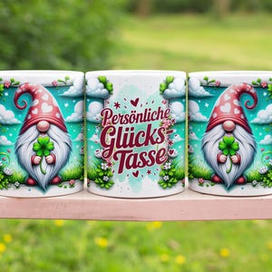May include: Three white ceramic mugs with a gnome design. Each mug features a different gnome holding a four-leaf clover. The middle mug has the text "Persönliche Glücks-Tasse" in red.