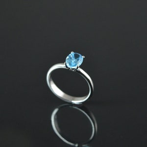 Blue Topaz Sterling Silver Ring: Oval Gemstone, December Birthstone