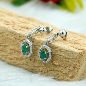 Emerald Sterling Silver Earrings: Oval Cut, White Topaz Halo