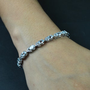Aquamarine Sterling Silver Bracelet: Oval Gemstone Tennis Bracelet