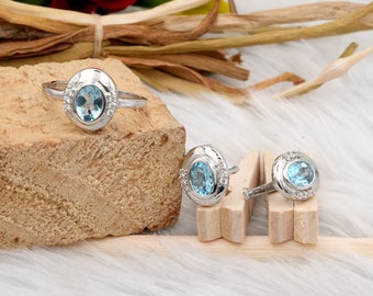 Blue Topaz Sterling Silver Ring & Earrings Set: Oval Cut Gemstone