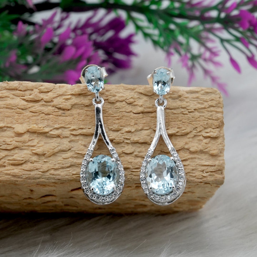 Buy Blue Topaz Sterling Silver Earrings: Oval Cut December