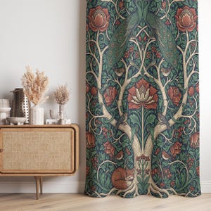 May include: A decorative curtain featuring a detailed botanical design with peacocks, birds, and a sleeping fox. The pattern includes red flowers, green leaves, and a dark blue background. The curtain is a home decor item.