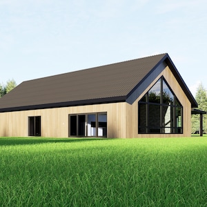 May include: A modern house with a light brown wooden exterior and a dark brown roof. Large windows offer a view of the interior. The house is set on a green lawn with trees in the background.