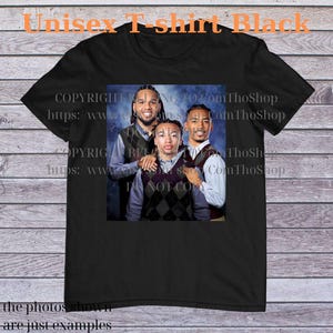 May include: Black unisex t-shirt featuring a photographic print of three people wearing argyle vests and collared shirts. The text "Unisex T-shirt Black" is at the top. The bottom of the shirt reads "the photos shown are just examples."