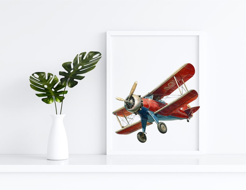 Op de afbeelding: Een ingelijste print van een rode en blauwe vintage biplane die tegen een witte achtergrond vliegt.
