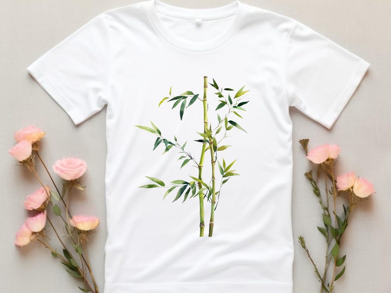 May include: White t-shirt featuring an illustration of a green bamboo plant.