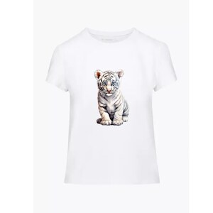 May include: White t-shirt with a graphic of a white tiger cub sitting down.