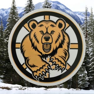 May include: A circular sticker featuring a snarling bear with sharp claws. The bear is in shades of tan and brown, set against a white and black circular border. The background shows a snowy mountain range and evergreen trees.