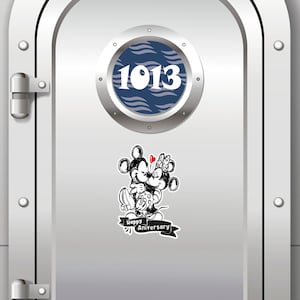May include: A silver metal door with a round porthole window. The porthole has a blue background with white waves and the number 1013. A black and white illustration of Mickey Mouse and Minnie Mouse kissing with a red heart and the text "Happy Anniversary" is on the door.
