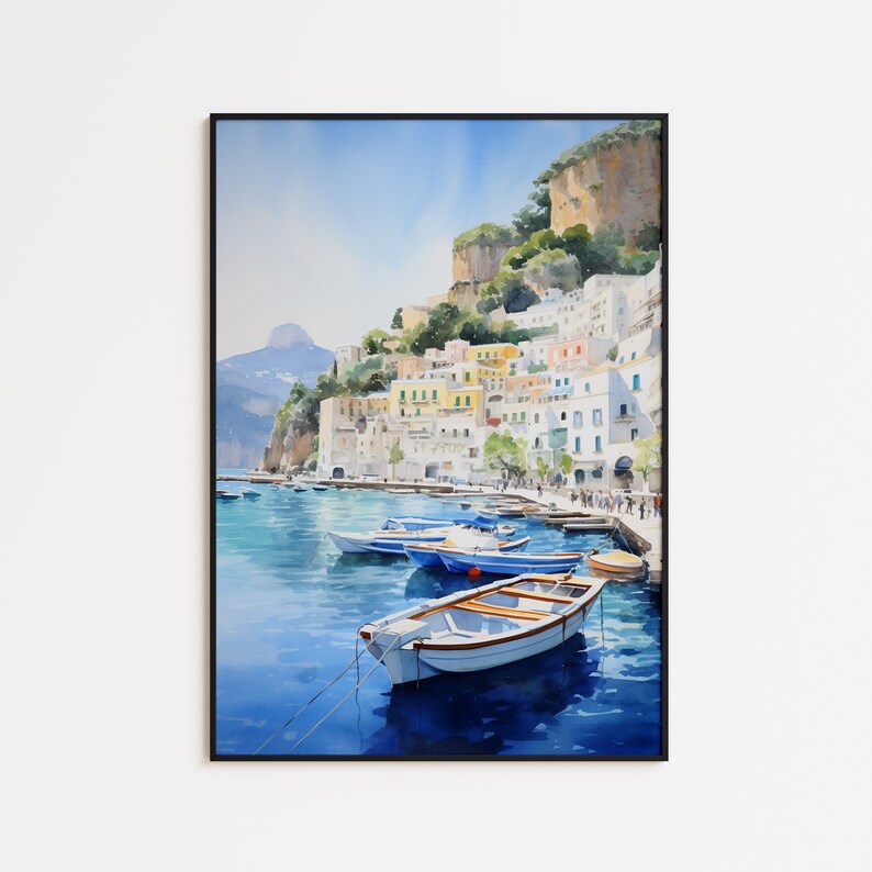 May include: Watercolor painting of a colorful Italian village on a cliffside overlooking a blue bay with several small boats docked. The sky is a light blue with white clouds.