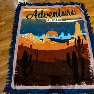 Adventure Awaits tie fleece blanket