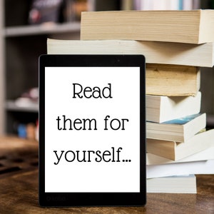 May include: A black and white e-reader displaying the text "Read them for yourself..." on the screen. The e-reader is positioned on a wooden table in front of a pile of books.