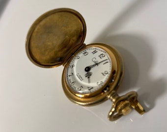 Small Gold Toned COLIBRI mechanical Pocket watch, 27 Jewels, Incabloc.