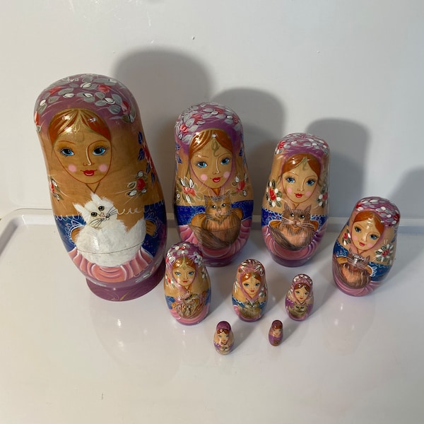 Vintage 10 Piece Russian Nesting Doll, Matryoshka woman holding a cat on each one.