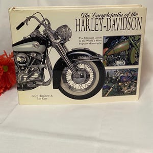The Encyclopedia of the Harley-Davidson by Peter Henshaw and Ian Kerr. 445 pages.