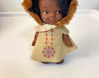 Small Eskimo Doll wearing a Parka. Stamped EeGee Co. 1966. 4 1/2” tall
