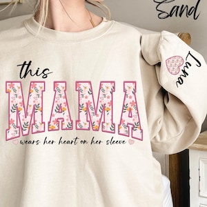 Custom This Mama Wears Her Heart On Her Sleeve Sweatshirt, Personalized Mom Sweatshirt With Kids Names, Cute Momma Hoodie, Mothers Day Gifts