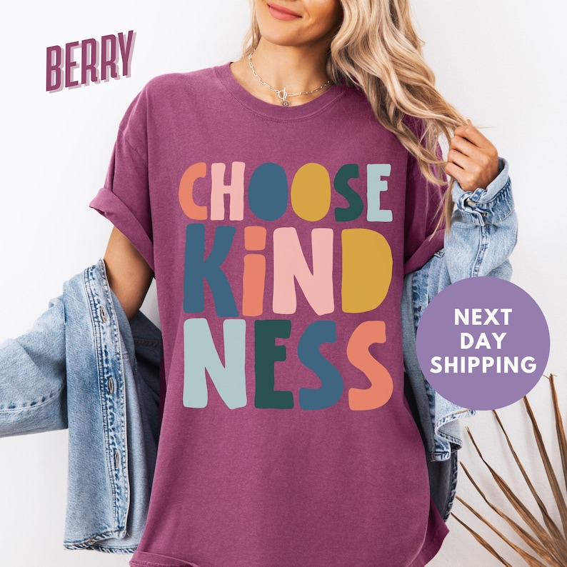 a woman wearing a t - shirt that says choose kind of nesss