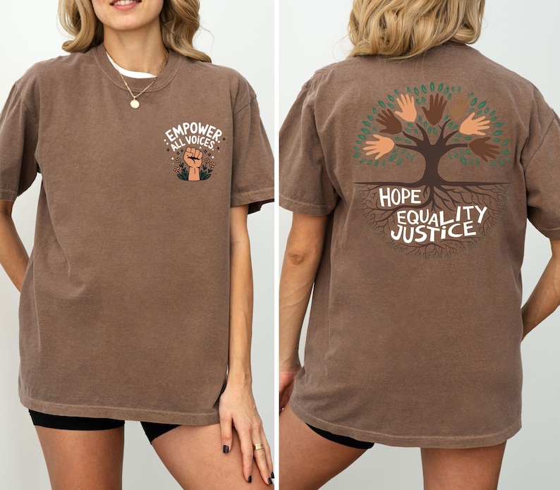 a woman wearing a brown shirt with a tree on it