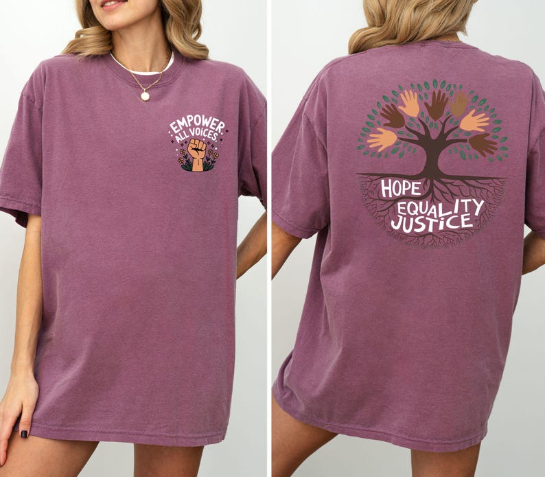 a woman wearing a purple shirt with a tree on it