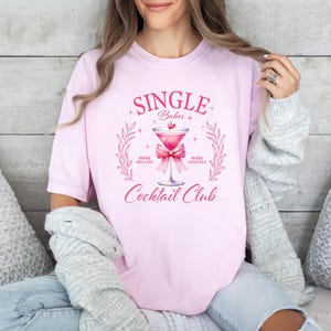 Single Babes Cocktail Club Comfort Colors® Shirt, Funny Valentine&#39;s Day Shirt, Pink Valentine Shirt, Valentine Coquette Shirt, Girls T-Shirt
