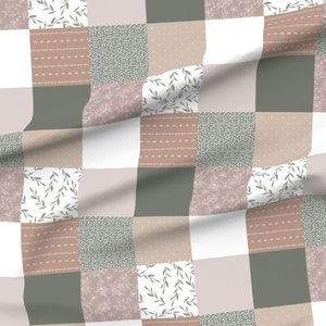 May include: A patchwork fabric with a repeating pattern of squares in shades of brown, green, and white. The fabric features different floral and leaf designs.