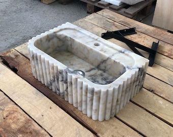 Lavabo de baño de mármol Calacatta Viola: Mueble de pared ranurado