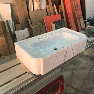 carrara marble sink,
wall mount sink,
floating vanity,
3 hole marble sink,
custom marble basin,
white stone sink,
modern bathroom sink,
handmade wall sink,
european marble sink,
natural stone vanity,
luxury wall basin,
minimalist sink,
artisan marble sink