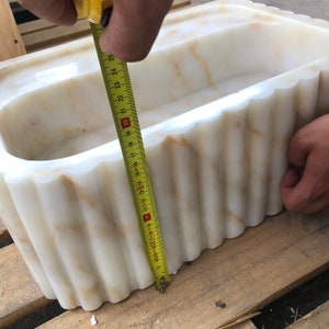 #HandCarvedSink #CalacattaViolaMarble #CustomizableVanityTop #CustomizableSink #BathroomSink #PowderRoomSink #FarmhouseSink #RareUniqueItem #WallMountSink #VesselSink #NaturalStoneSink #MarbleBathroomSink #LuxuryBathroomDecor #MarbleSinkCo