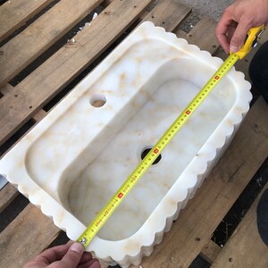 #HandCarvedSink #CalacattaViolaMarble #CustomizableVanityTop #CustomizableSink #BathroomSink #PowderRoomSink #FarmhouseSink #RareUniqueItem #WallMountSink #VesselSink #NaturalStoneSink #MarbleBathroomSink #LuxuryBathroomDecor #MarbleSinkCo
