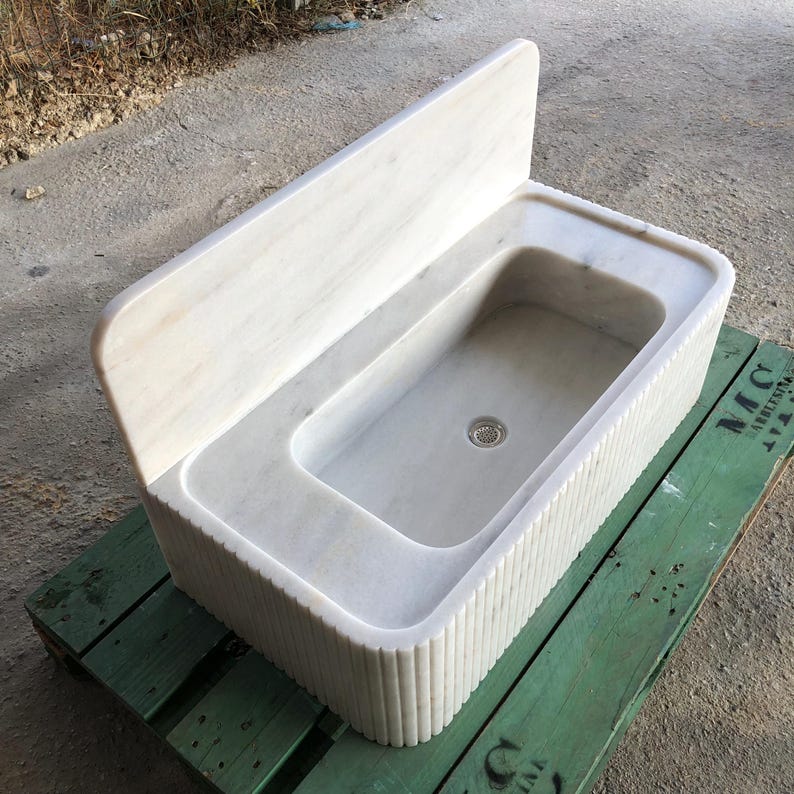 #marblesink #whitebathroom #bathroomdesign #vesselsink #stonevesselsink #interiordesign #interiordesigner #interiorstyling #bathroominspo #customsink #luxuryinterior #bathroomrenovation #naturalstone #vanitydesign #interiorproject #architecturaldetails #moderninterior #marbledesign #bathroomvanity #wallmountsink #designobsessed #bathroomgoals #luxurybathroom #homedecortrends #interiorgoals #minimalistdesign #sculpturaldecor #bathroomtrends2025 #naturalstonesink #etsyfinds