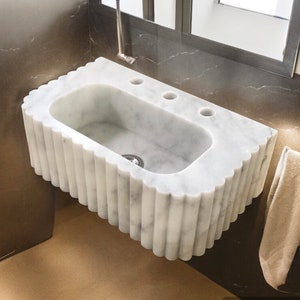 #HandCarvedSink #CarraraMarbleSink #CustomizableVanityTop #CustomizableSink #BathroomSink #PowderRoomSink #FarmhouseSink #RareUniqueItem #WallMountSink #VesselSink #NaturalStoneSink #LuxuryBathroomSink #ElegantBathroomDecor