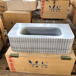 natural-carrara-marble-veining-close-up.jpg