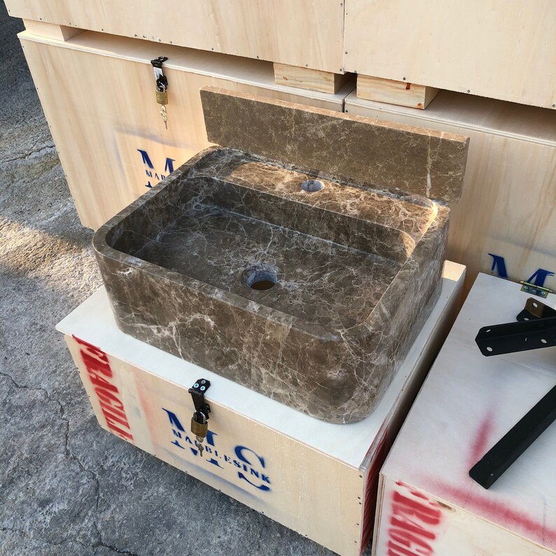 Dark Emperador Marble Sink
Luxury Brown Stone Basin
Wall Mount Or Countertop
Rich Natural Veining
Handcrafted From Solid Marble
Custom Sizes Available
Perfect For Powder Rooms
Made By Stone Artisans
Secure Crated Shipping
Designed For Luxury Bathrooms