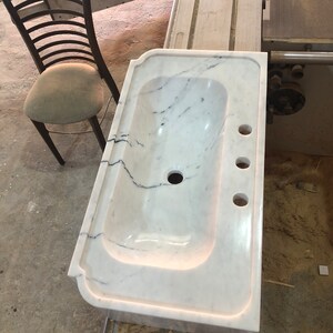 carrara marble sink,
wall mount sink,
floating vanity,
3 hole marble sink,
custom marble basin,
white stone sink,
modern bathroom sink,
handmade wall sink,
european marble sink,
natural stone vanity,
luxury wall basin,
minimalist sink,
artisan marble sink