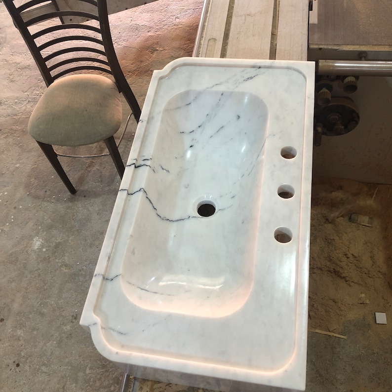 carrara marble sink,
wall mount sink,
floating vanity,
3 hole marble sink,
custom marble basin,
white stone sink,
modern bathroom sink,
handmade wall sink,
european marble sink,
natural stone vanity,
luxury wall basin,
minimalist sink,
artisan marble sink