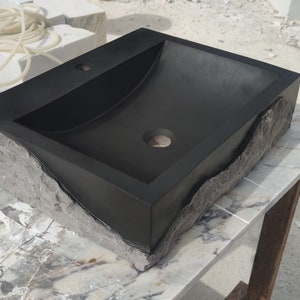 🖤 Discover the timeless beauty of our handcrafted rectangular black lava stone sink, carved from natural volcanic basalt. Perfect for wall-mounted, countertop, or vessel installations. Each piece is uniquely veined and artisan-crafted for luxury bathrooms. A bold statement for modern interior design. Durable, water-resistant, and shipped worldwide in a protective wooden crate via DHL Express.